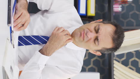 Vertical-video-of-Sick-businessman-coughing-and-not-feeling-well.